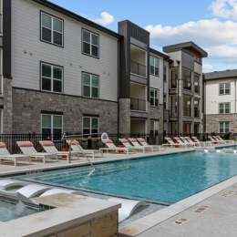 swimming pool with a building behind